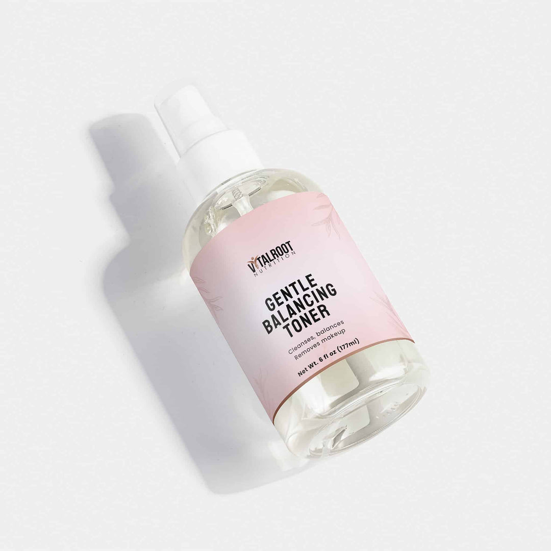 Bottle of 'Vitalbody' gentle balancing toner on a light gray background