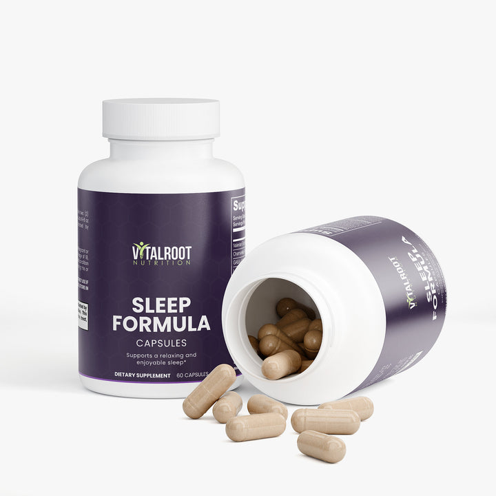 Vitalroot Nutrition Sleep Formula capsules with open bottle on a white background