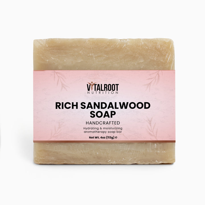 Bar of Rich Sandalwood Soap with pink label on a white background
