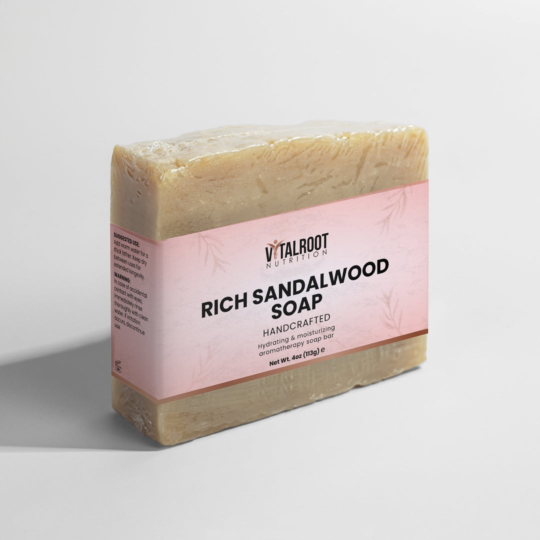 Bar of soap with a pink label on a white background