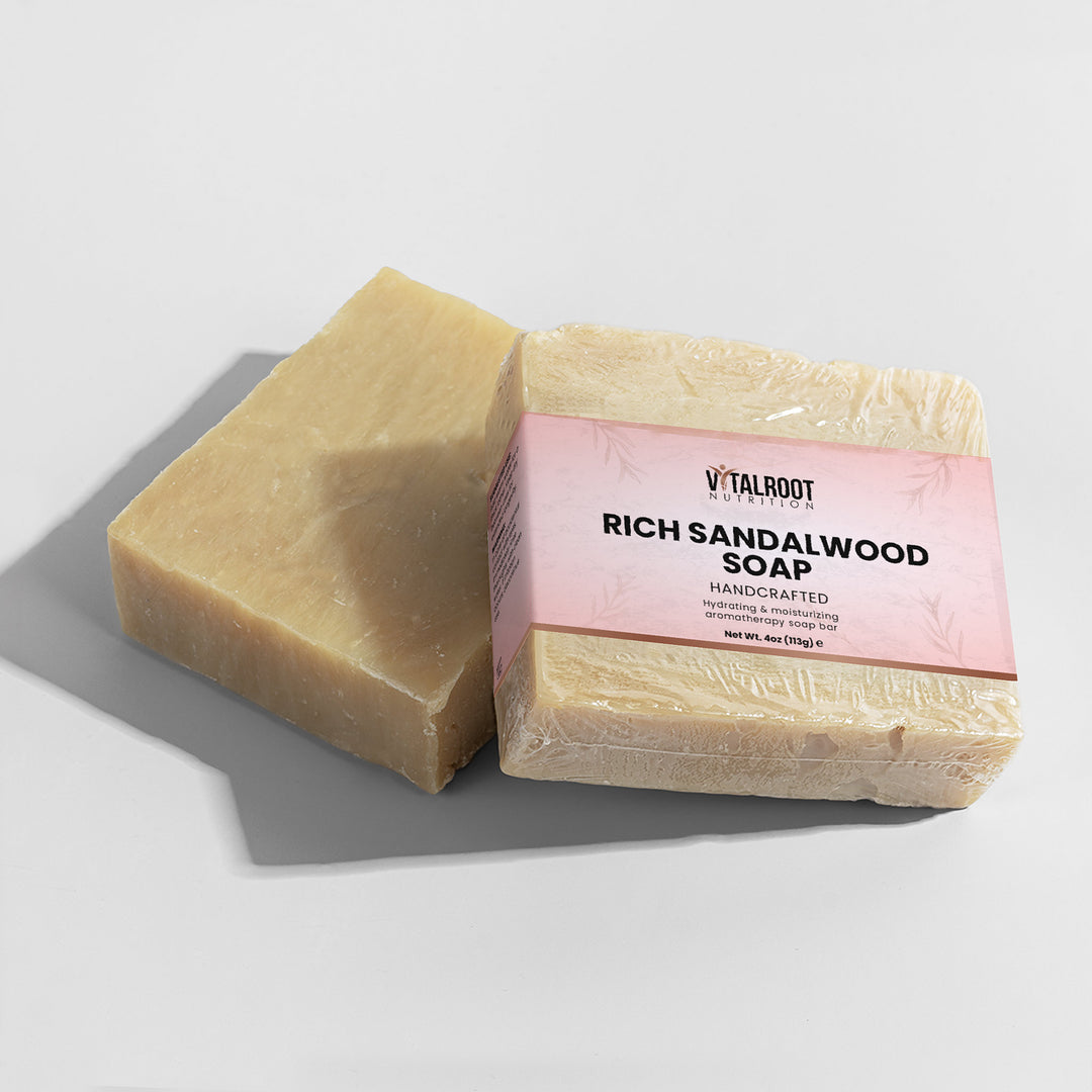 Bar of Rich Sandalwood Soap with a pink label on a gray surface