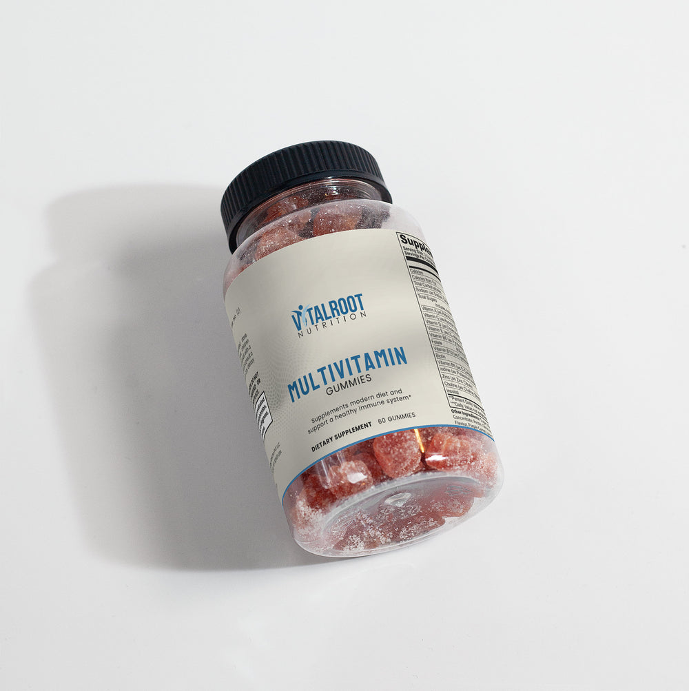 Jar of multivitamin gummies with a label on a light gray background