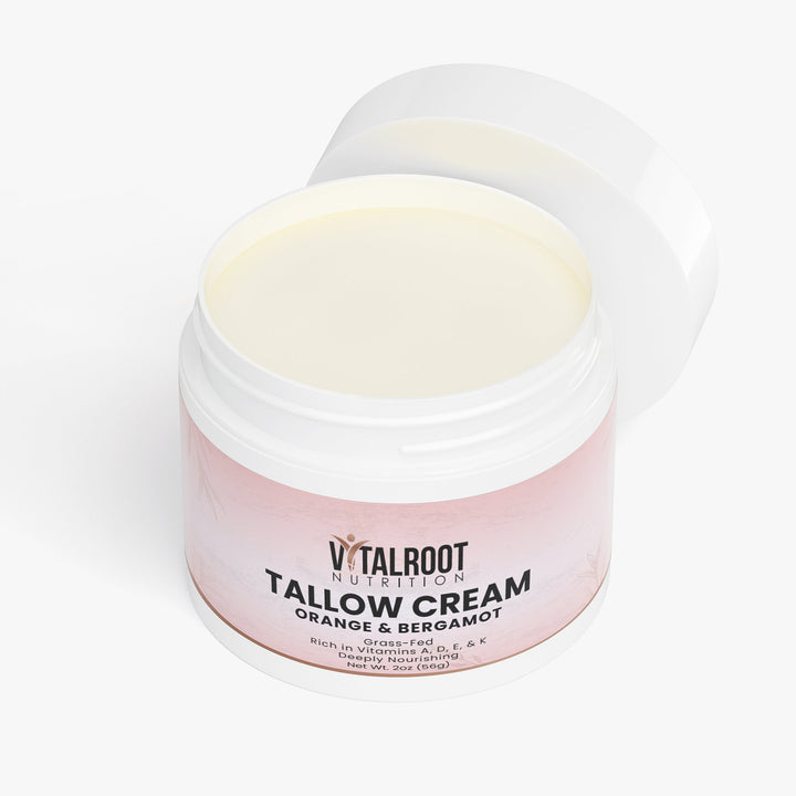 Jar of Vitalroot Tallow Cream with a pink label on a white background