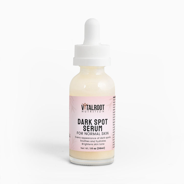Vitalroot Dark Spot Serum bottle with pink label on a white background