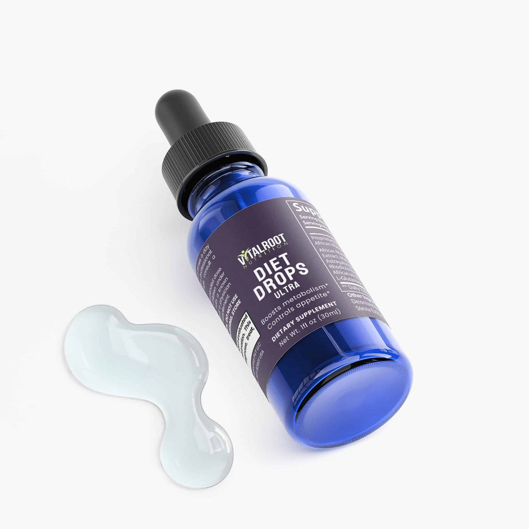Blue bottle labeled 'Diet Drops Ultra' with a dropper on a white background
