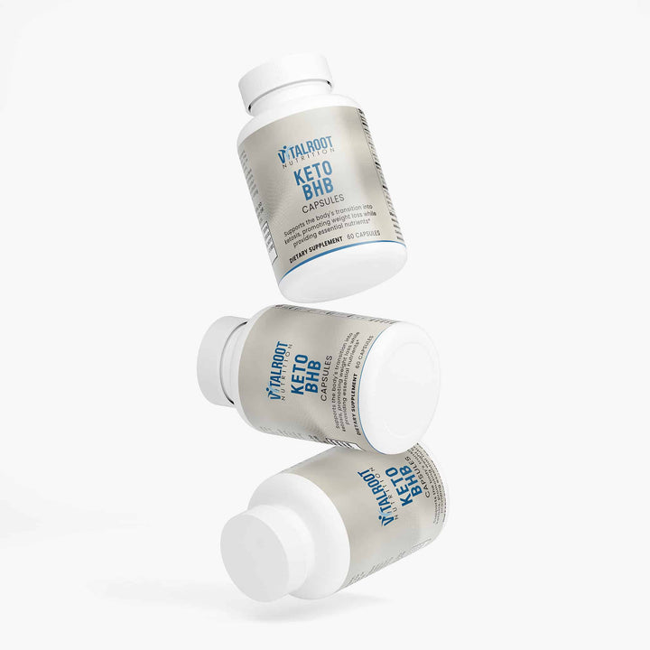 Three bottles of Yaloboy Keto BHB capsules on a white background