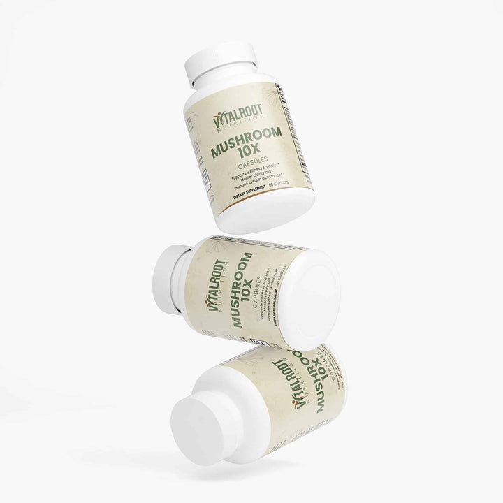 Three bottles of Vitalroot Mushroom 10X capsules on a white background