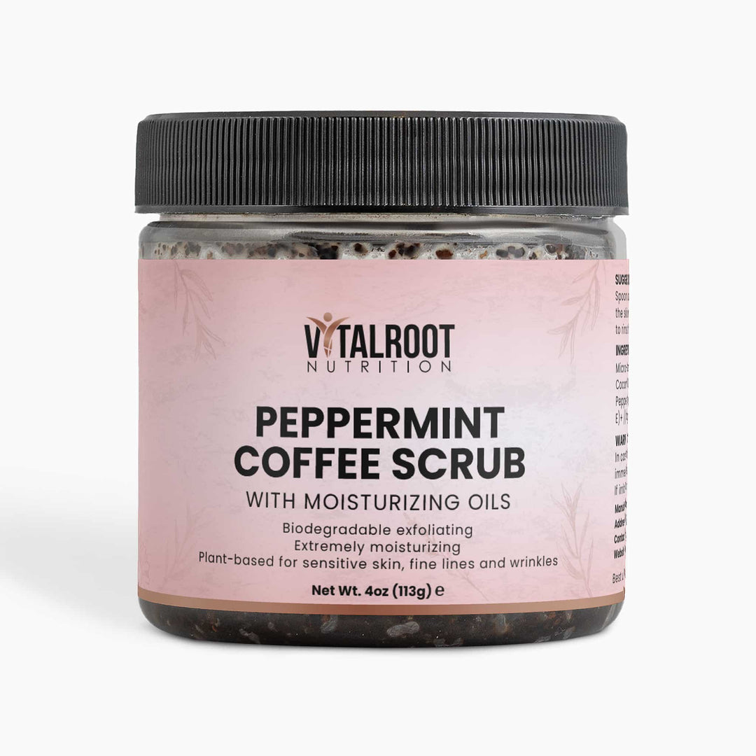 Jar of peppermint coffee scrub with pink label on a white background