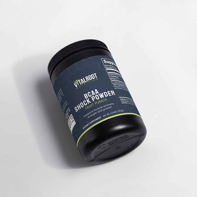 Side view of VitalRoot Nutrition BCAA Shock Powder Fruit Punch, focusing on the product label and container design.