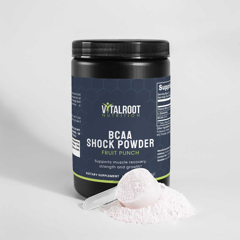 VitalRoot Nutrition BCAA Shock Powder Fruit Punch with a scoop placed next to the container, emphasizing the powder and serving size.