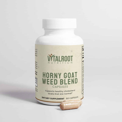 Close up of Horny Goat Weed Blend capsule by VitalRoot Nutrition in front of bottle for cholesterol levels.